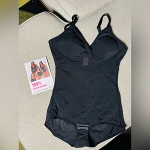 Never worn brief body suit